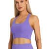 Model wearing fiit pixie sports bra in Lavender