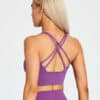 Model wearing fiit pixie sports bra in Mauve
