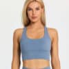 Model wearing fiit pixie sports bra in workshop blue